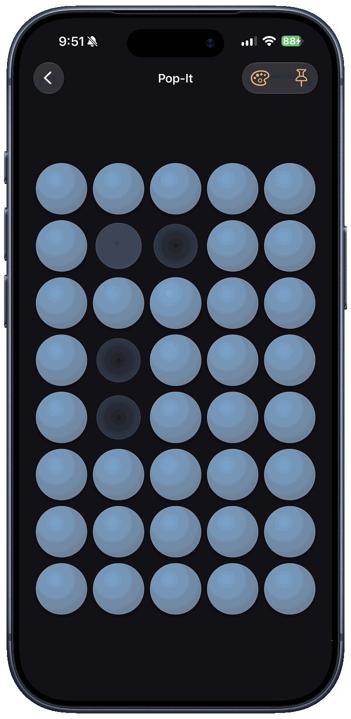 Fiddlewick's Pop-It fidget in an ocean-blue theme — a full grid of glossy bubbles to press